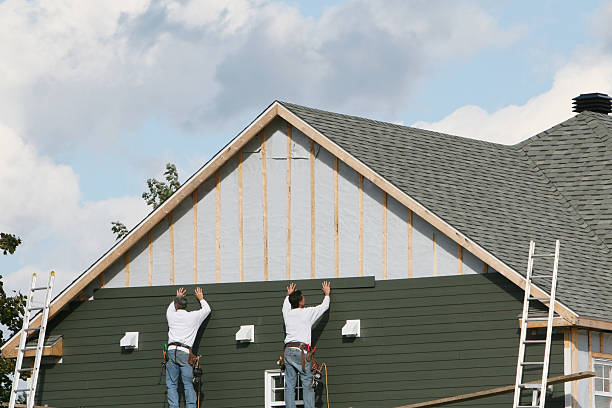 Professional Siding Installation technician working in Powhatan Point, OH